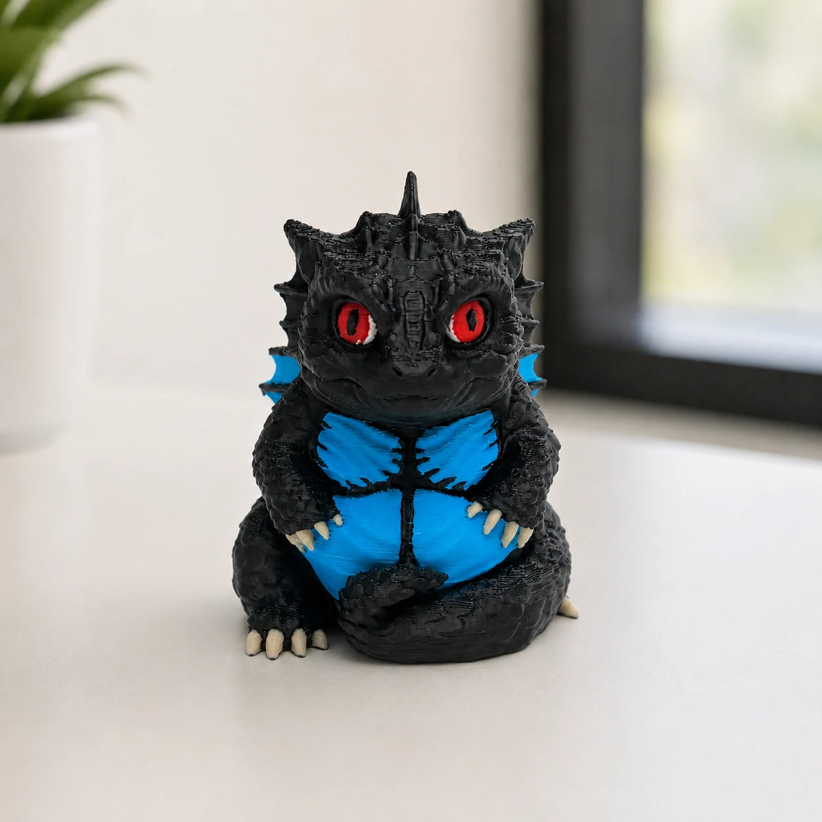KODA Guardian Dragon desk figurine – multicolor FDM 3D printed – lifestyle scene desk setting – PrintableArtForge
