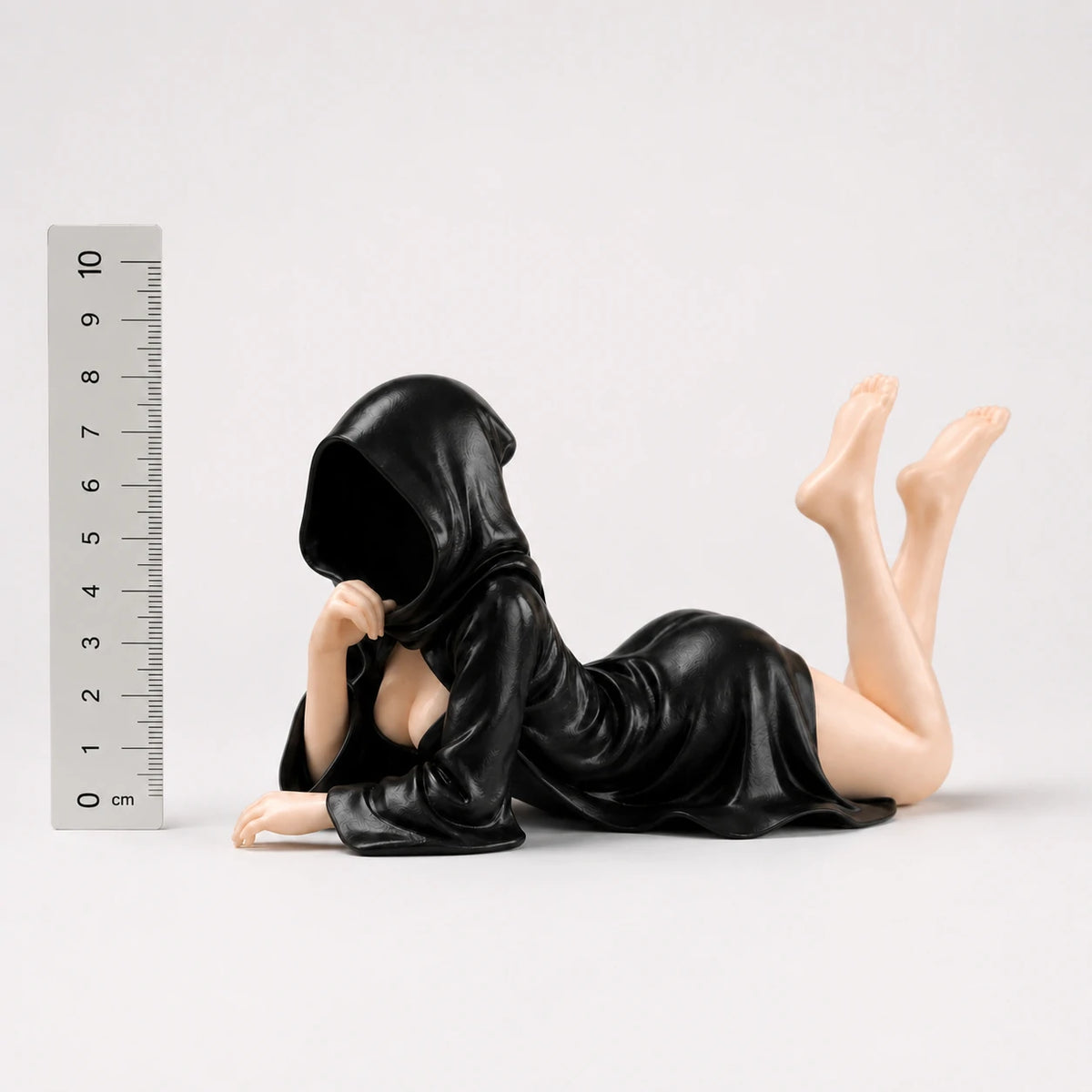 The Fallen faceless hooded figurine – gothic shelf decor matte black resin – size comparison with ruler – PrintableArtForge
