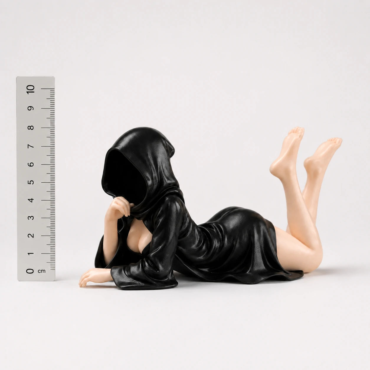 The Fallen faceless hooded figurine – gothic shelf decor matte black resin – size comparison with ruler – PrintableArtForge