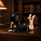 The Fallen faceless hooded figurine – gothic shelf decor matte black resin – lifestyle scene dark shelf – PrintableArtForge