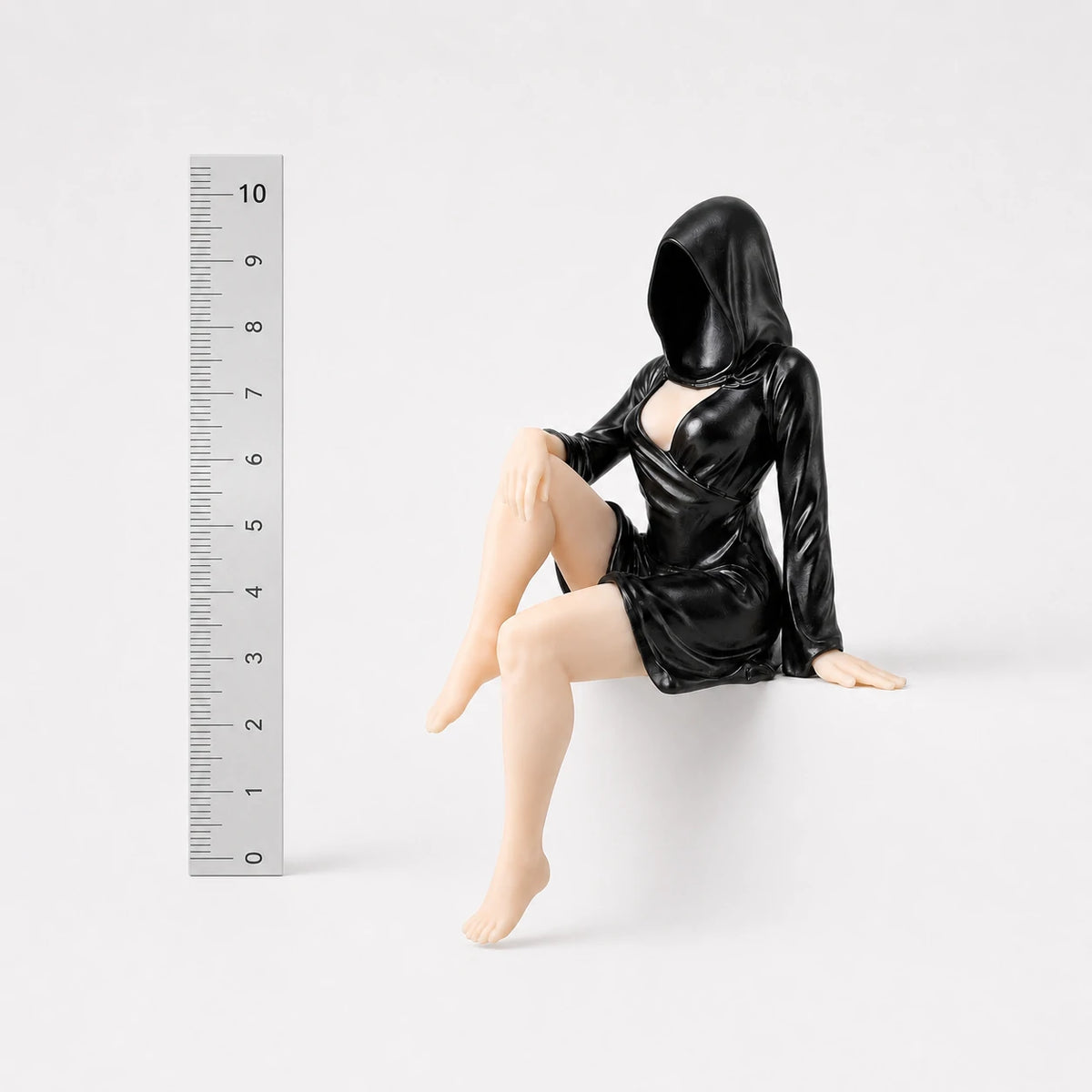 The Wanderer faceless hooded figurine – gothic shelf decor matte black resin – size comparison with ruler – PrintableArtForge