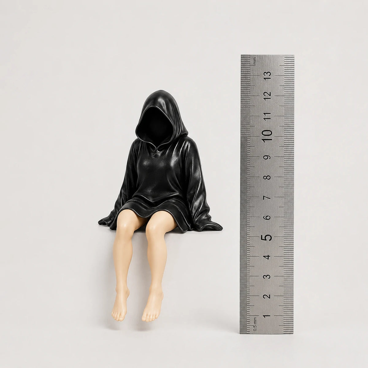 The Watcher faceless hooded figurine – gothic shelf sitter matte black resin – size comparison with ruler – PrintableArtForge